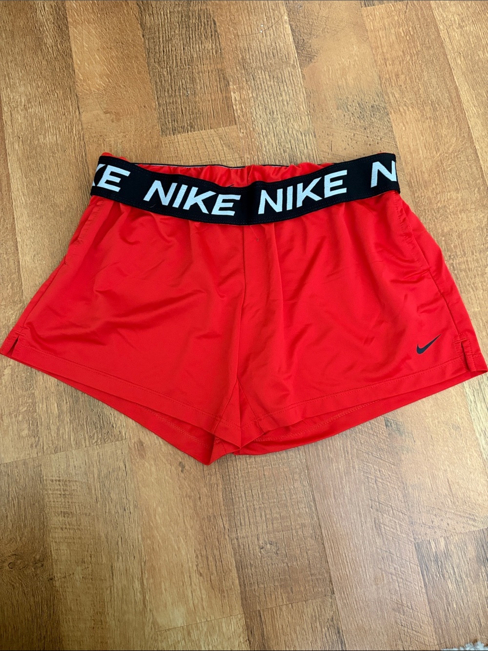 Nike Women's Red Athletic Shorts with Black Branded Waistband